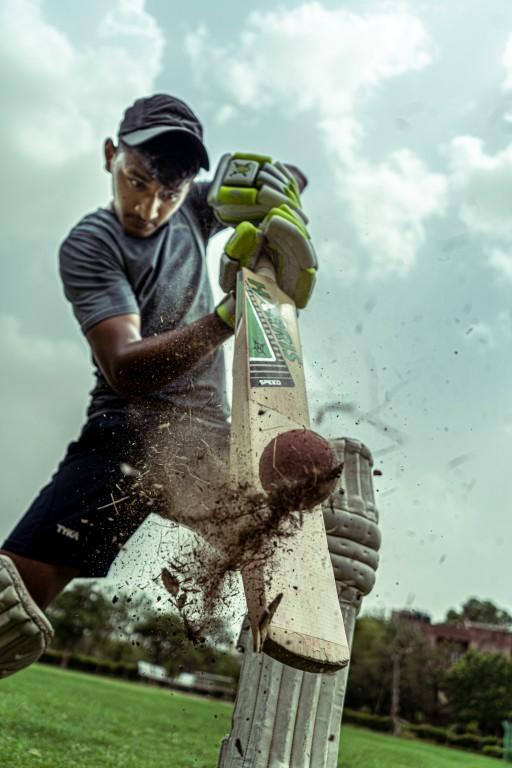 Batsman striking the ball