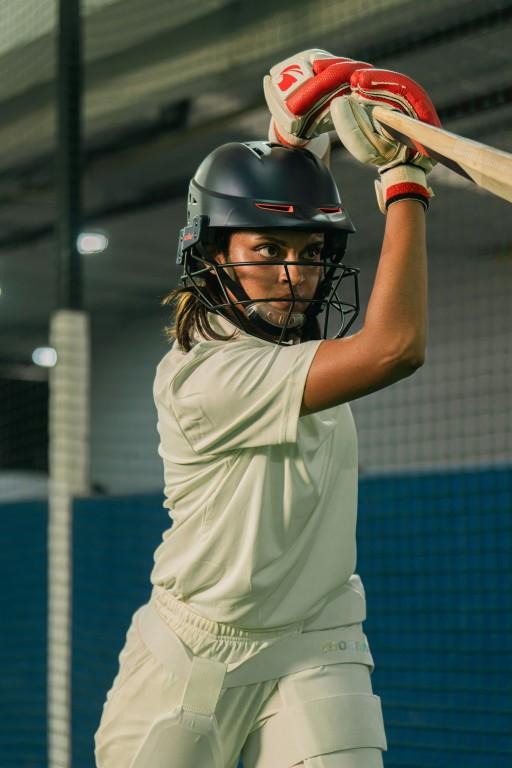 Cricketer batting on the pitch